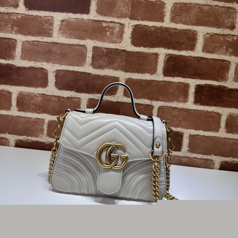 G*u*i top handle bags